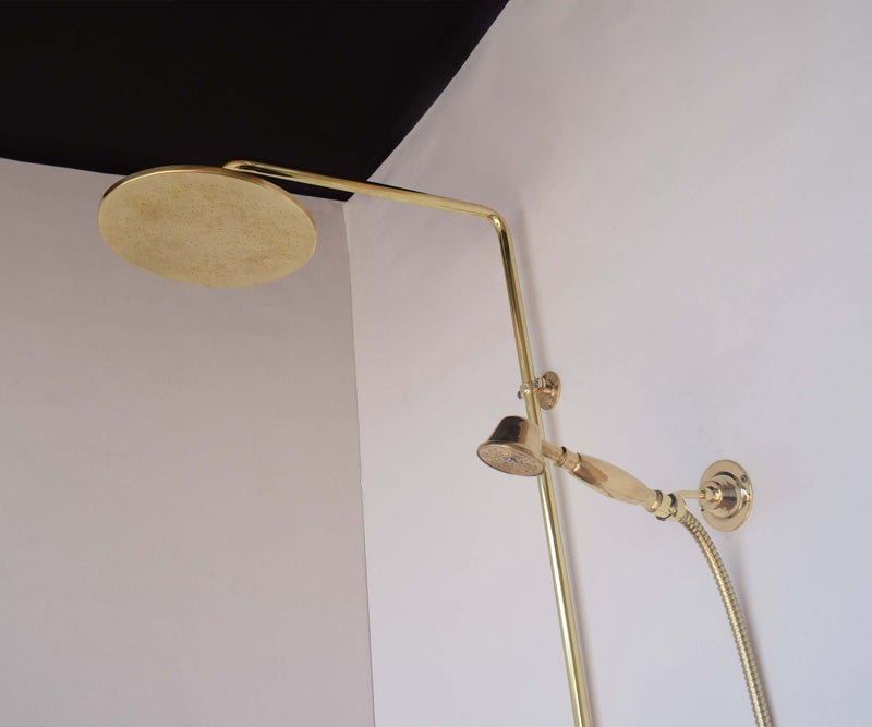 Unlacquered brass exposed shower system